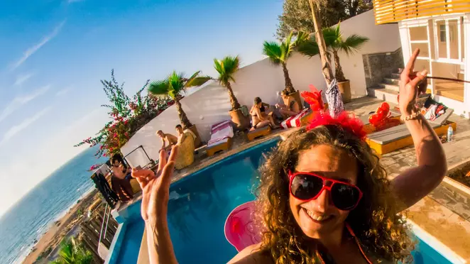 Poolside social time at a Morocco surf retreat